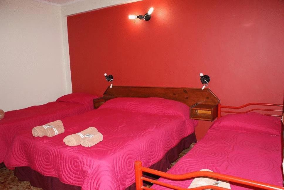 Residencial Noelia Hostel بويرتو إجوازو الغرفة الصورة